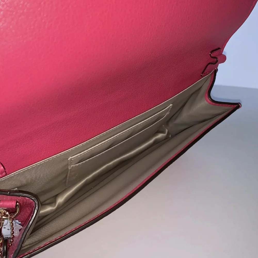 Coach details embossed
